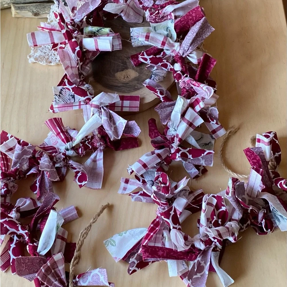 Primitive Red and White fabric garland with splashes of pink, green and black